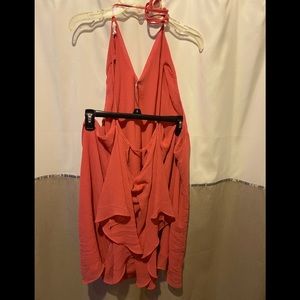 Maurices Chiffon flowy halter top.  Ties in the back with keyhole neckline.